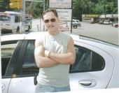 Raymond Tini