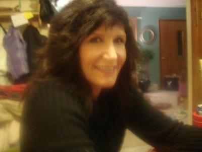 Angela Mason